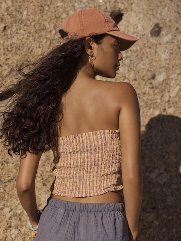 Next - Top en naranja