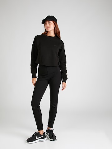 GUESS Sportief sweatshirt 'Cymone' in Zwart