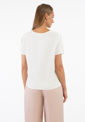 RISA - Blusa en blanco