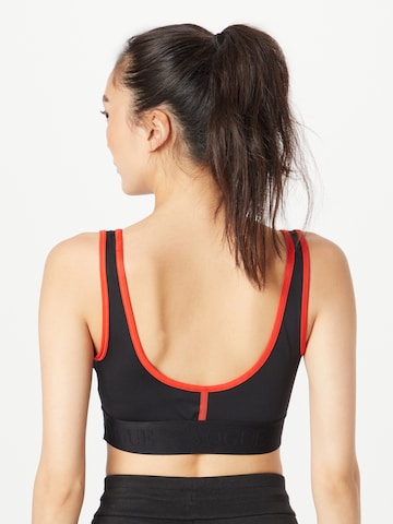 PUMA Bustier Sport-BH in Schwarz