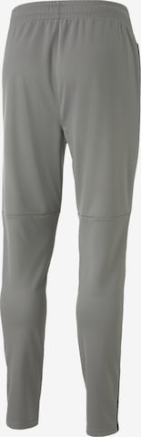 Effilé Pantalon de sport PUMA en gris