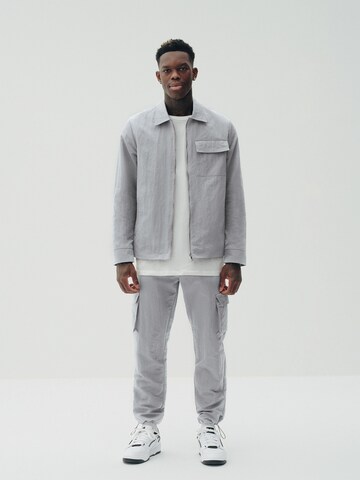 Sinned x ABOUT YOU Between-season jacket 'Leo' in Grey