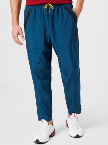 PUMA Loosefit Sportbroek 'First Mile' in Blauw: voorkant