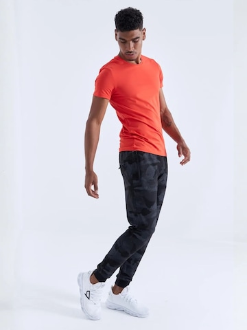 Skinny Pantaloni sportivi di Tommy Life in nero