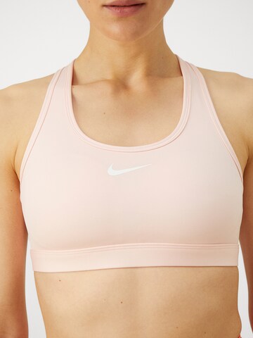 NIKE Bustier Sportmelltartók 'Swoosh' - rózsaszín