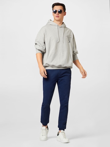Tommy Jeans Tapered Hose 'Scanton' in Blau