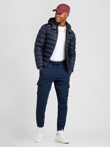 Tapered Pantaloni cu buzunare de la Tommy Jeans pe albastru