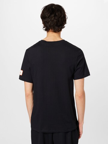 T-Shirt fonctionnel NIKE en noir