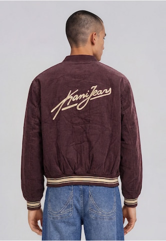 Karl Kani Between-season jacket in Brown: front