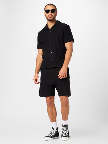 Regular Pantaloni 'Austin' de la WEEKDAY pe negru