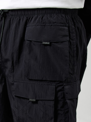Loosefit Pantalon cargo Nike Sportswear en noir