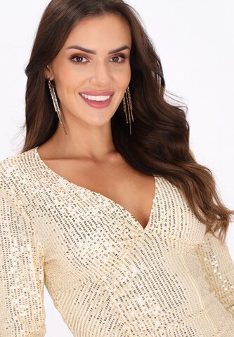Robe de cocktail faina en or