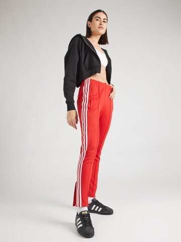 ADIDAS ORIGINALS Slimfit Παντελόνι 'Adicolor Sst' σε κόκκινο