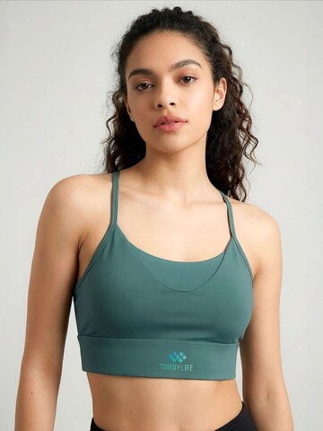 Tommy Life Bra 'TOMMY Damen-Figurbetontes Crop-Active-Top' in Green: front