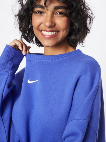 Nike SportswearSweater majica 'Phoenix Fleece' - ljubičasta boja
