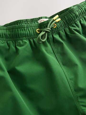 žalia Next Maudymosi trumpikės