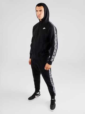 Nike Sportswear Joggingdragt 'CLUB FLEECE' i sort