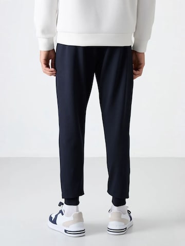 Tommy Life Tapered Workout Pants 'Jogginghose' in Blue