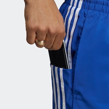 ADIDAS SPORTSWEAR Regular Workout Pants 'Essentials Chelsea' in Blue