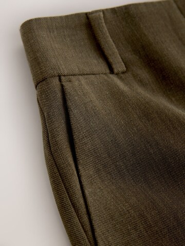 žalia Next Plačios klešnės Kelnės su kantu