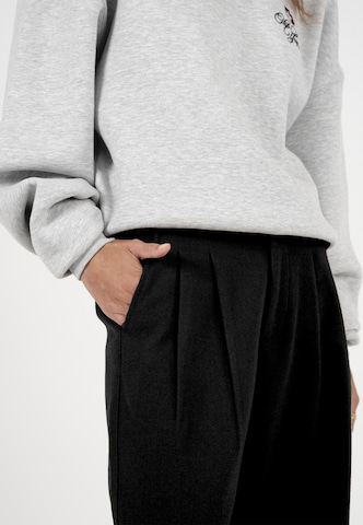 Prohibited Zvonové kalhoty Kalhoty – černá