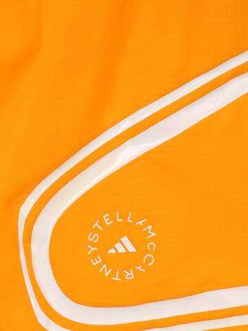 ADIDAS BY STELLA MCCARTNEYLoosefit Sportske hlače 'Truepace ' - narančasta boja