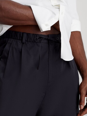 Calvin Klein Loose fit Pleat-Front Pants in Black
