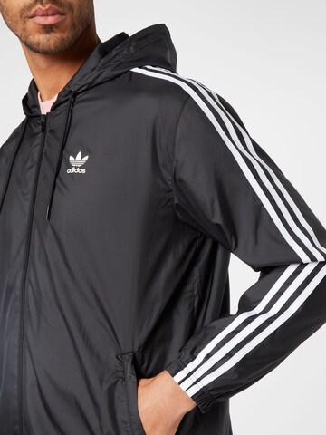 ADIDAS ORIGINALS Přechodná bunda – černá