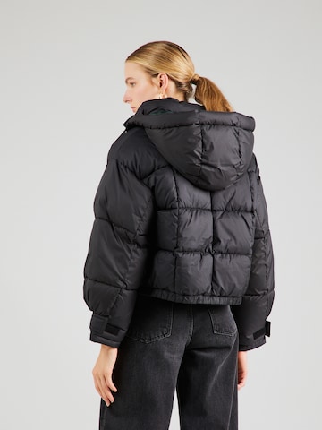 LEVI'S ® Übergangsjacke 'Baby Trapeze Puff' in Schwarz