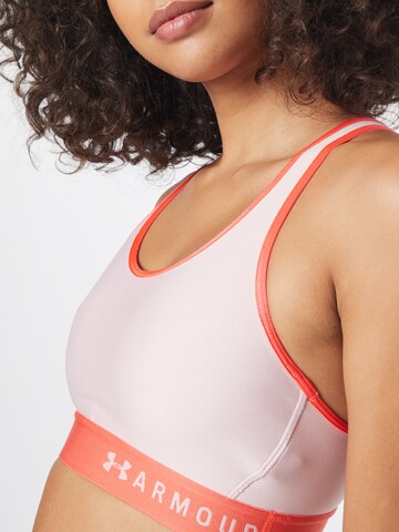 Bustier Soutien-gorge de sport UNDER ARMOUR en rose