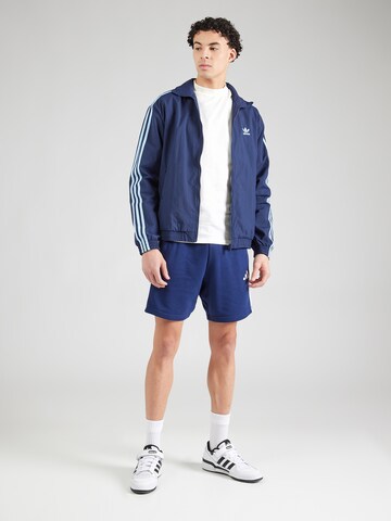 Geacă de primăvară-toamnă de la ADIDAS ORIGINALS pe albastru
