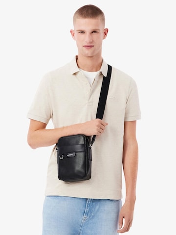 LACOSTE Skuldertaske 'Lacoste Sacoche Ossian Homme NH5047OI Noir' i sort