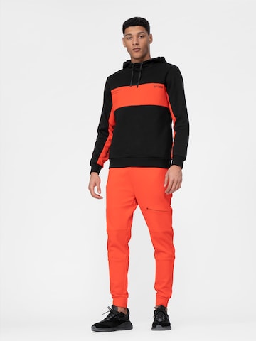 4F - Tapered Pantalón deportivo en naranja