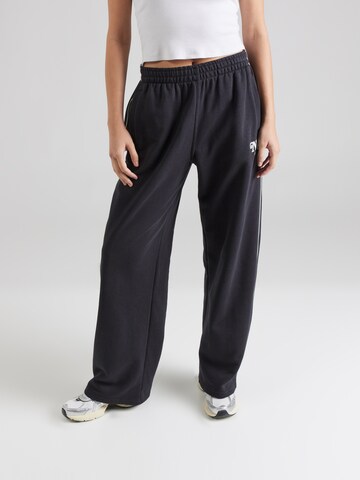 Loosefit Pantaloni de la Nike Sportswear pe negru: față