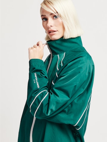 žalia UNFOLLOWED x ABOUT YOU Sportinė striukė 'ESCAPE JACKET'