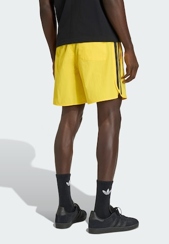 ADIDAS ORIGINALSregular Hlače - žuta boja