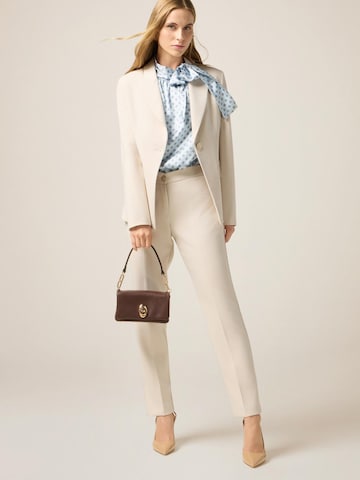 Blazer oltre en beige