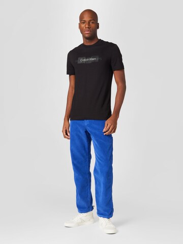 Calvin Klein Bluser & t-shirts i sort