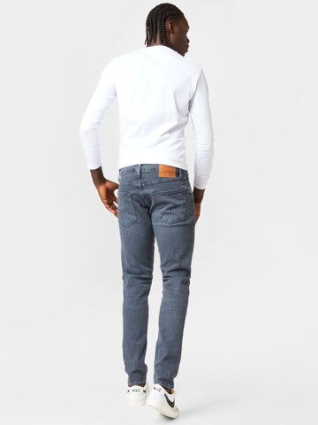 LEVI'S ® Tapered Jeans '512 Slim Taper' i blå