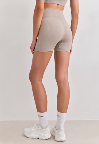Skinny Pantalon de sport Aim'n en marron