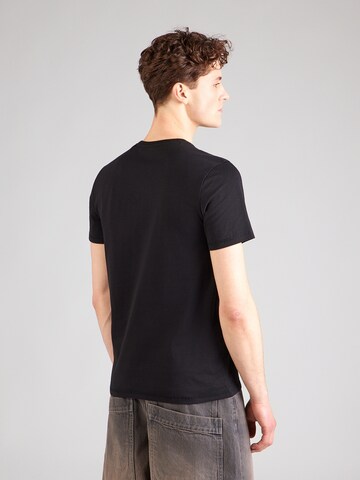GUESS - Camiseta en negro