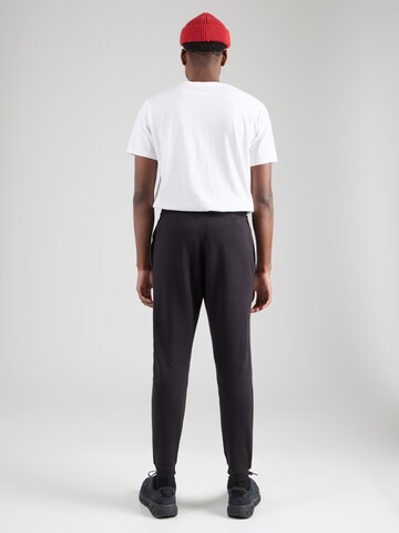 Tapered Pantaloni sport 'Identity' de la Reebok pe negru