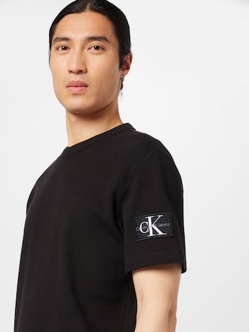 Calvin Klein Jeans T-Shirt in Schwarz | ABOUT YOU