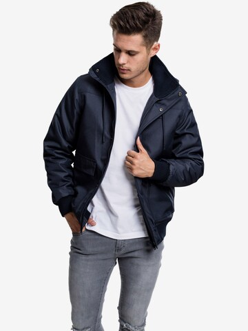 Veste mi-saison Urban Classics en bleu : devant