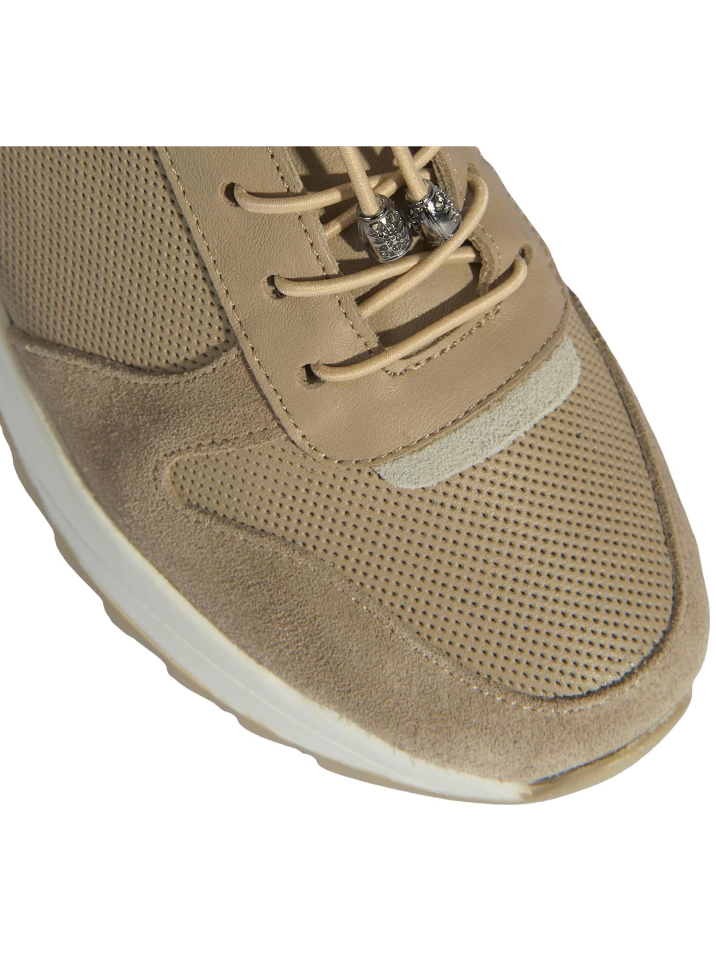 Desa Sneakers laag 'Trainer' in Bruin