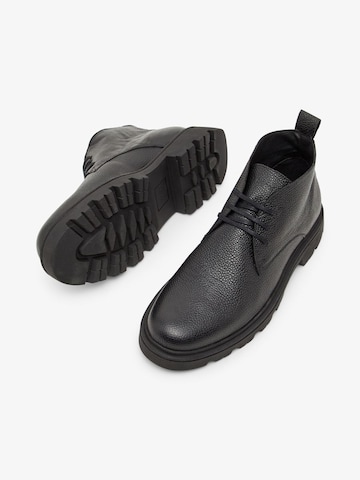 Boots stringati 'Sharp' di Bianco in nero