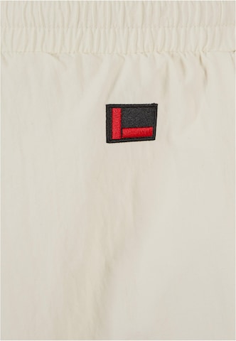 Loosefit Pantaloni di FUBU in beige