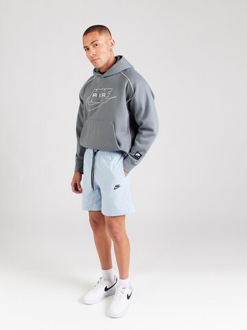 Nike Sportswear Loosefit Broek 'TECH' in Blauw