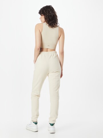 Effilé Pantalon de sport aim'n en beige