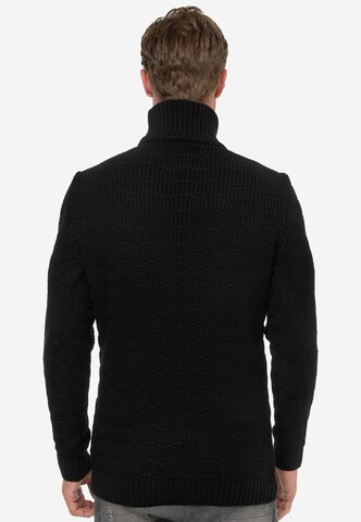 Rusty Neal Pullover in Schwarz